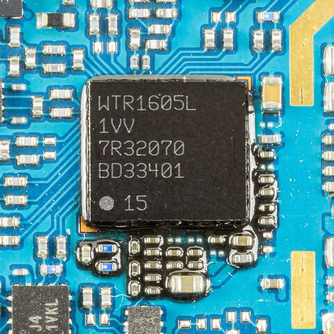 A Qualcomm chip and the traces connecting it to the board